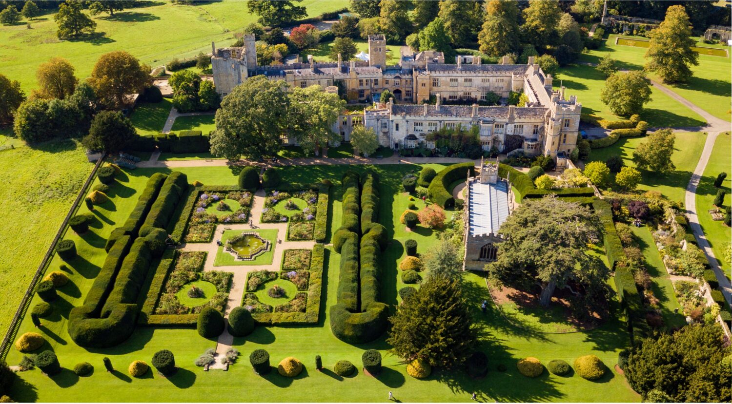 High aerial shot of the castle and it's grounds