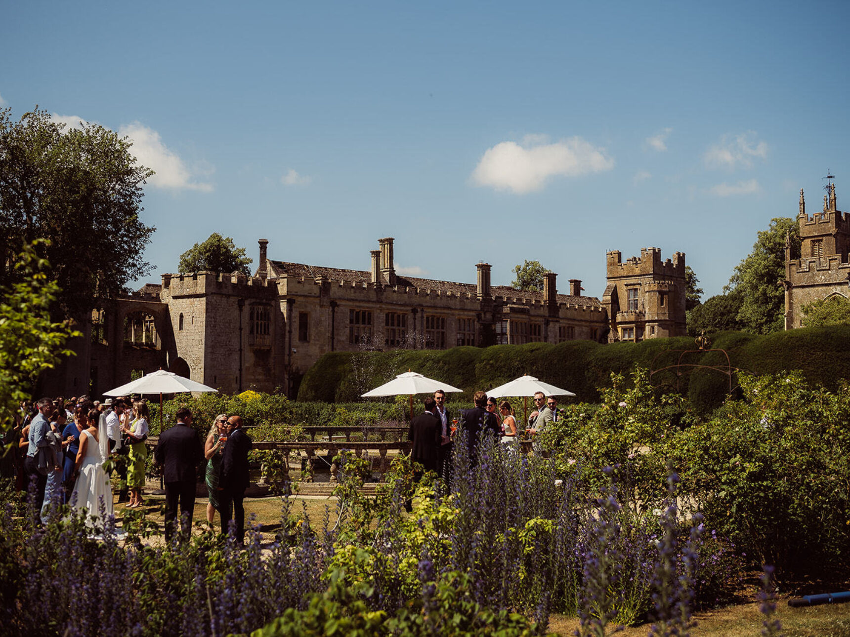 Add your touch to the rose garden's beauty with a string quartet, glasses of bubbles and parasols.