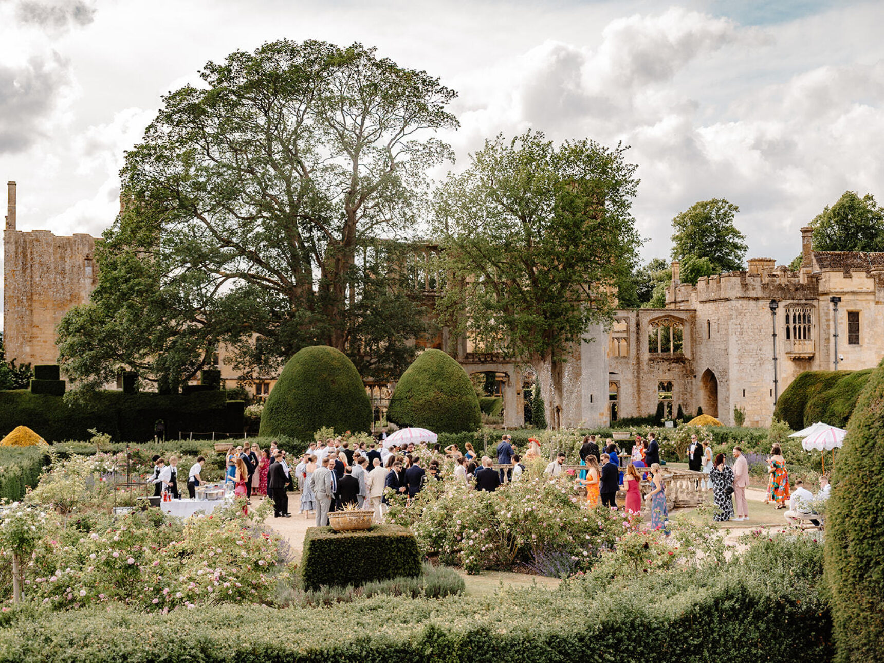 Your guests can roam amongst the flower beds and yew hedges.