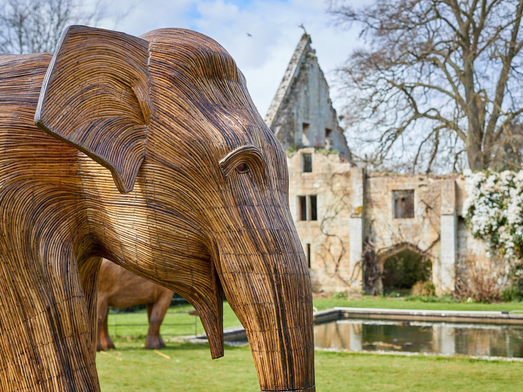 close up of elephant sculpture in front of Tithe Barn