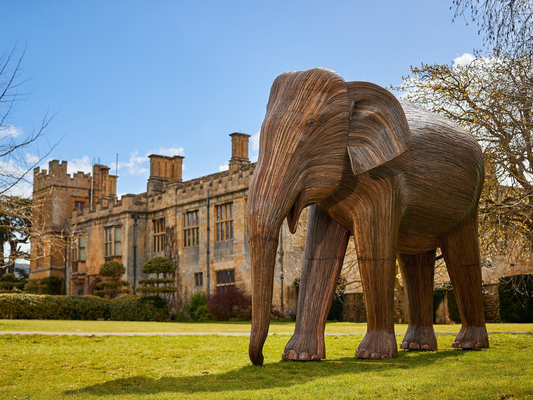 Large Bachelor Elephant sculpture in front of castle