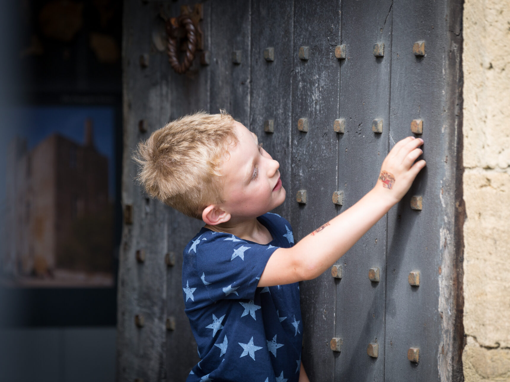 Boy at castle door