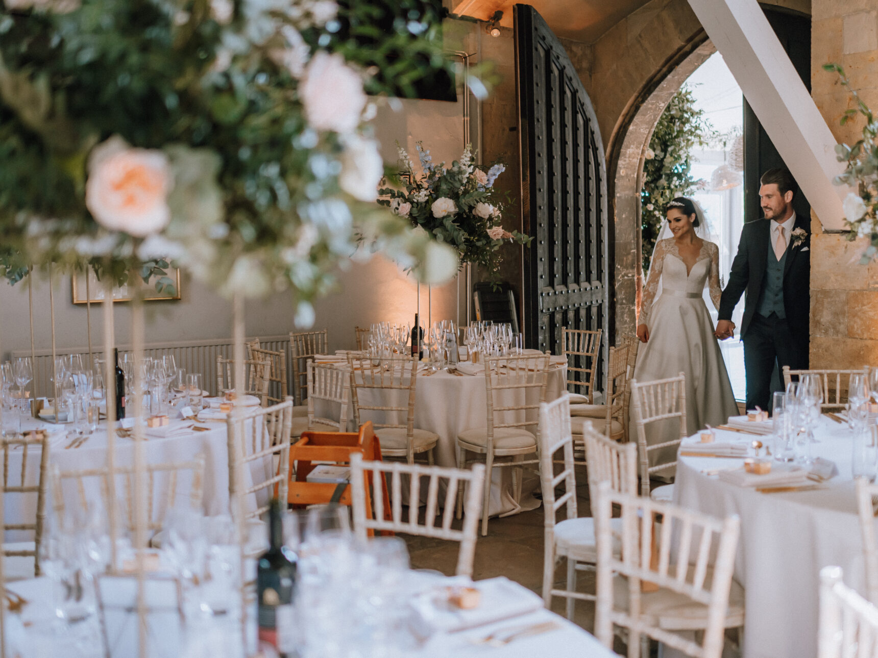 Magnificent wooden doors connect The Castle Coach House & bar with The Orangery