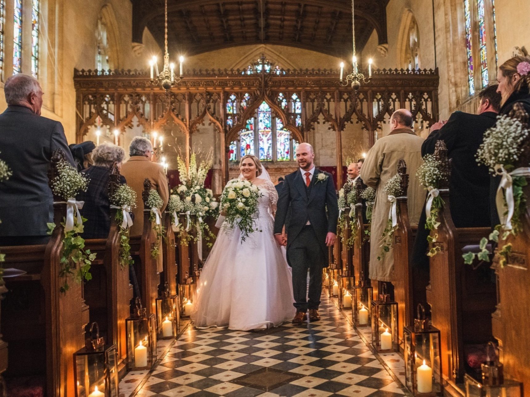 Bride and Groom walking through aisle after wedding ceremony