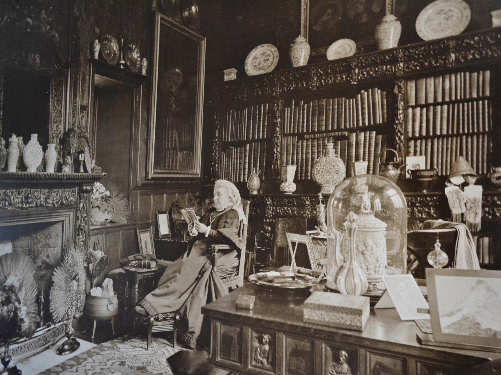 Emma Dent sat in the Sudeley library